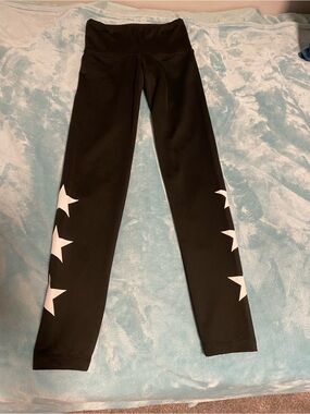NWOT STRUT THIS Black Leggings with White Star Print